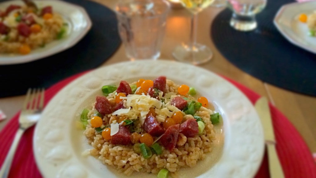 Cremiges Risotto mit Trüffelwurst, Haselnüssen und Cherrytomaten