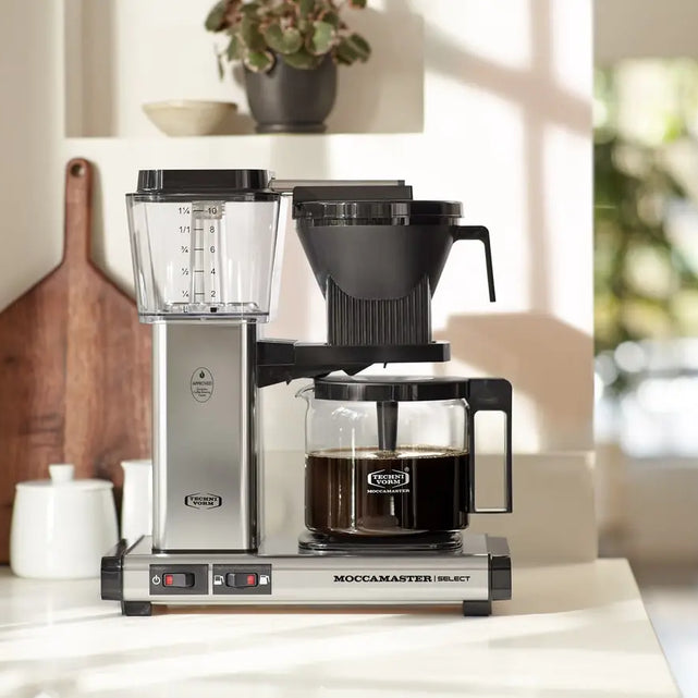 Entkalken Sie die Kaffeemaschine