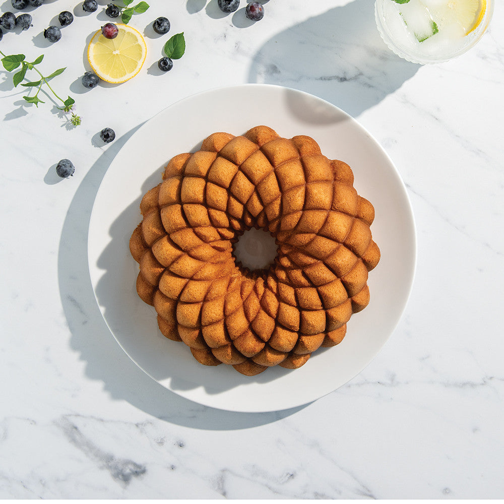 Nordic Ware Gugelhupfform Kaleidoscope Bundt Gold - Aluguss - ø 23 cm